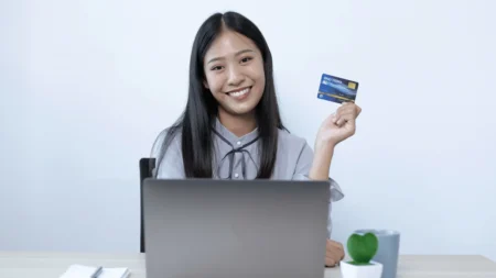 holding a credit card